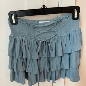 Ramy Brook Stormi Lace-Up Tier Ruffle Mini Skirt in the color "Blue Moon"